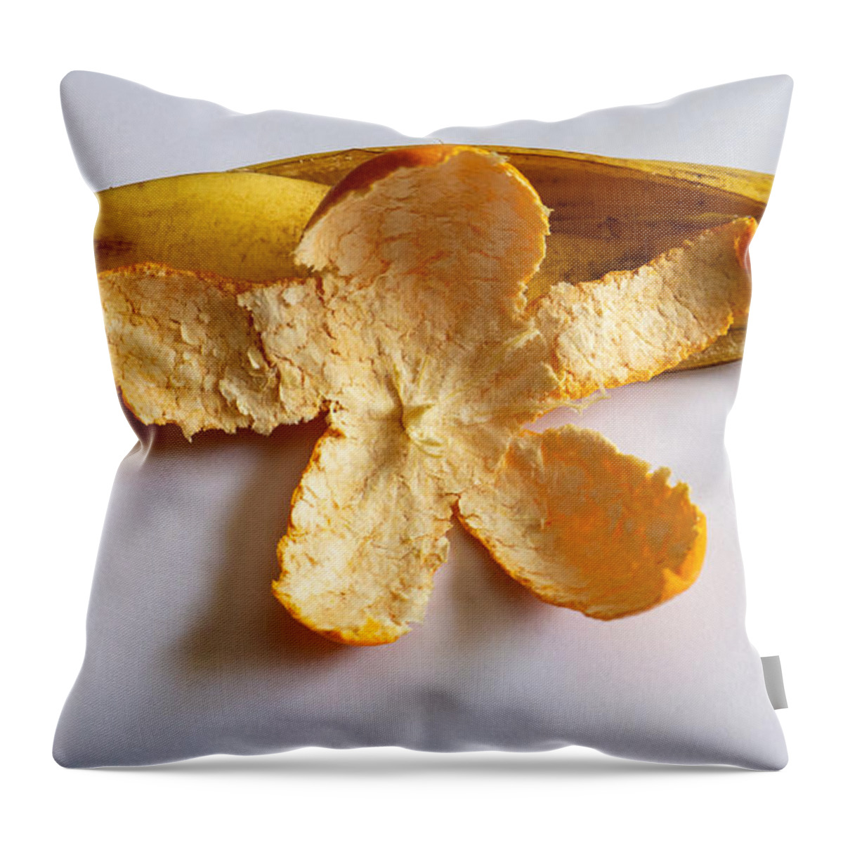 Orange Throw Pillow featuring the photograph Orange on Banana by Ivars Vilums