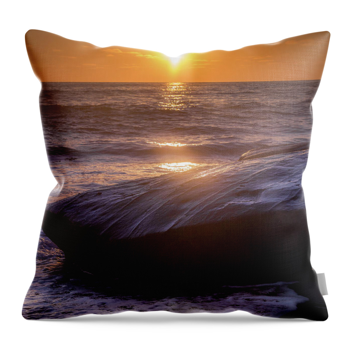 Beach Throw Pillow featuring the photograph Orange Skies and Purple Rocks by Aaron Burrows