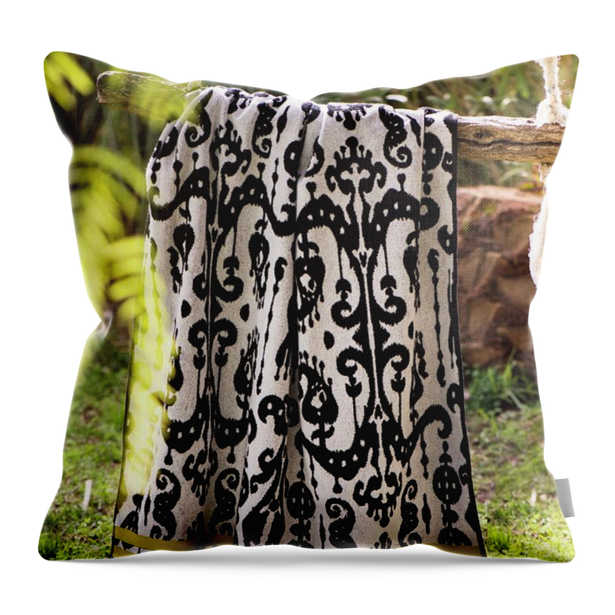 Ip_11507726 Throw Pillow featuring the photograph Ornately Patterned Towel Hanging In Garden by Winfried Heinze