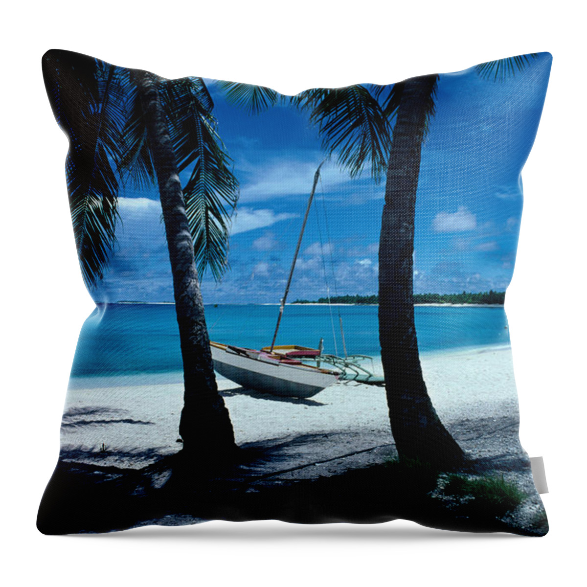 Shadow Throw Pillow featuring the photograph Outrigger Canoe On A Palm-fringed by Oliver Strewe