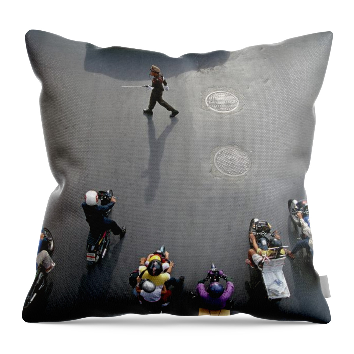 Crash Helmet Throw Pillow featuring the photograph People Riding Motor Scooters On City by Marc Volk
