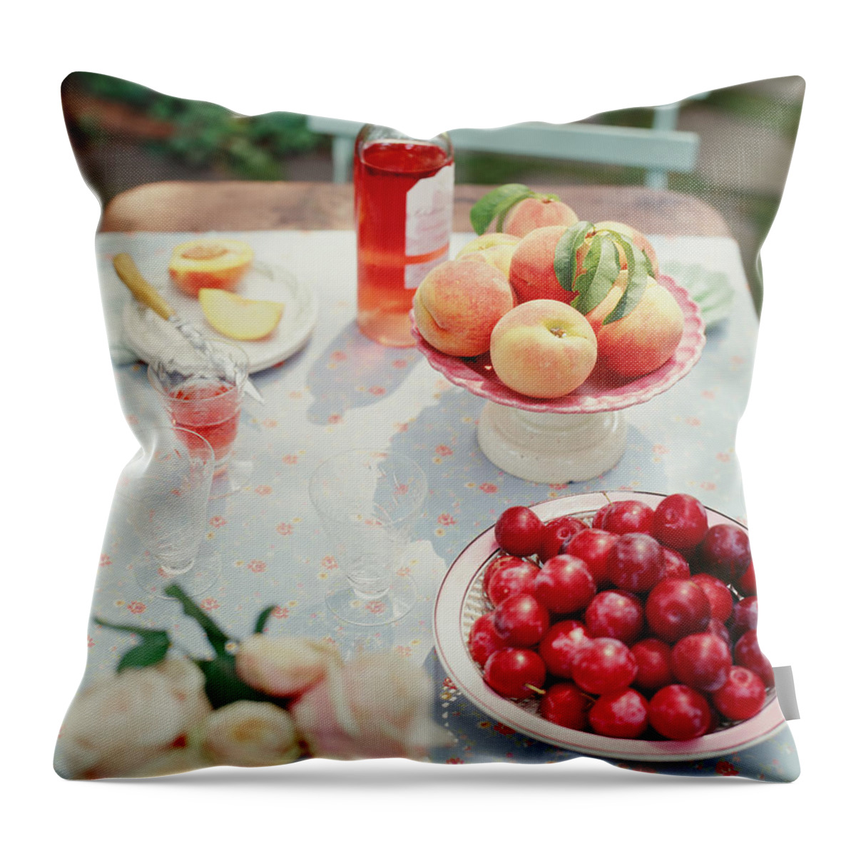 Plum Throw Pillow featuring the photograph Plums, Peaches, Wine And Flowers On A by Victoria Pearson