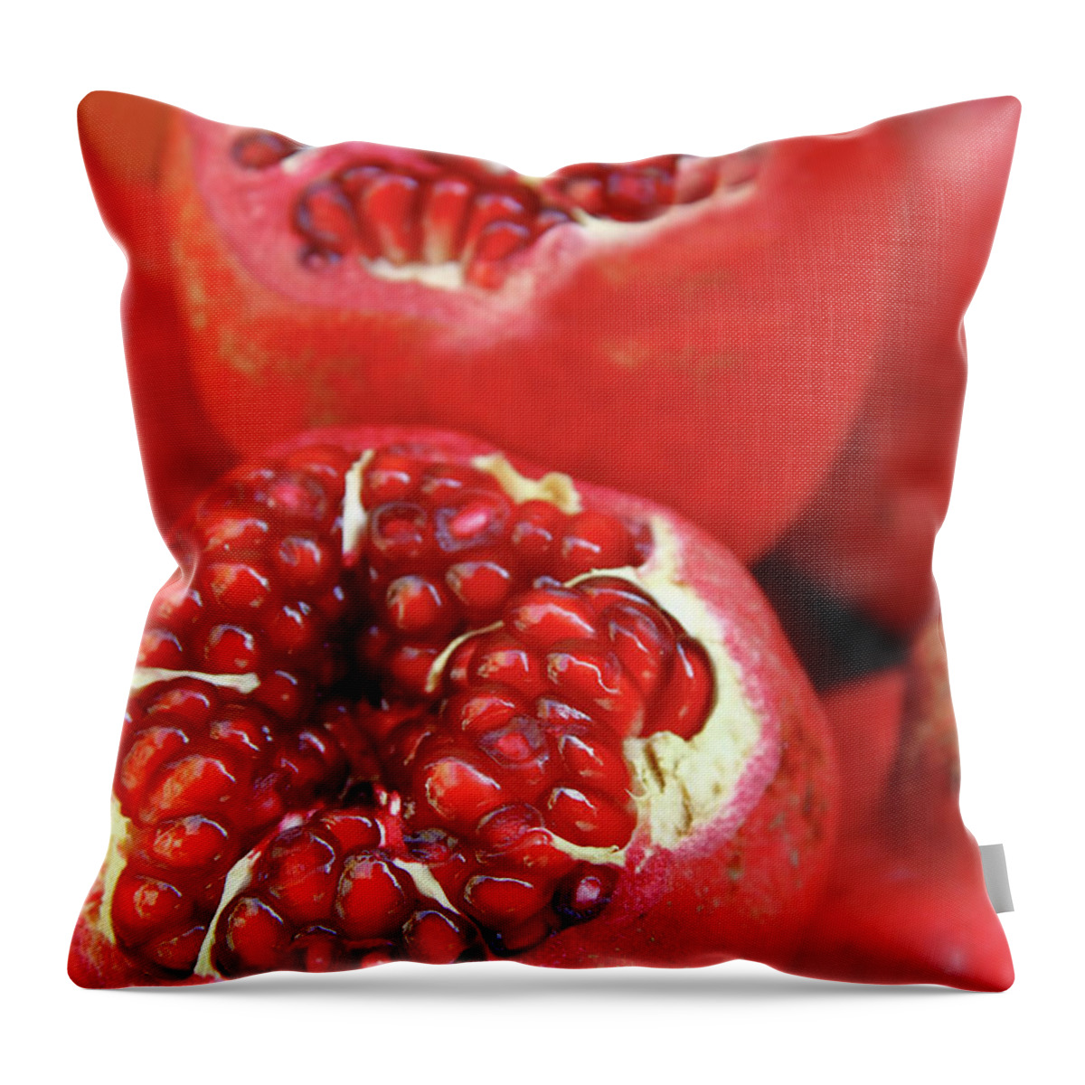 Fermenting Throw Pillow featuring the photograph Pomegranates by Oonal