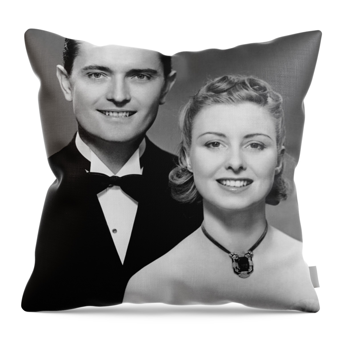 Heterosexual Couple Throw Pillow featuring the photograph Portrait Of Couple In Formal Wear by George Marks
