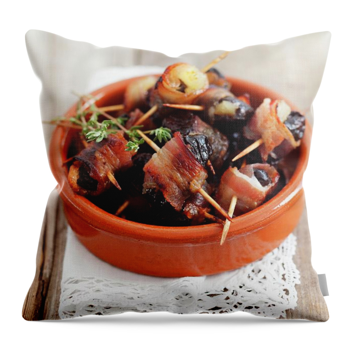 Ip_11225587 Throw Pillow featuring the photograph Prunes Filled With Apple Pure And Wrapped In Pancetta by Rua Castilho