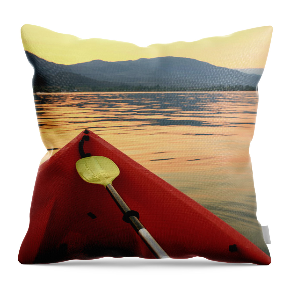 Recreational Pursuit Throw Pillow featuring the photograph Red Canoe On A Beautiful Mountain Lake by Imaginegolf