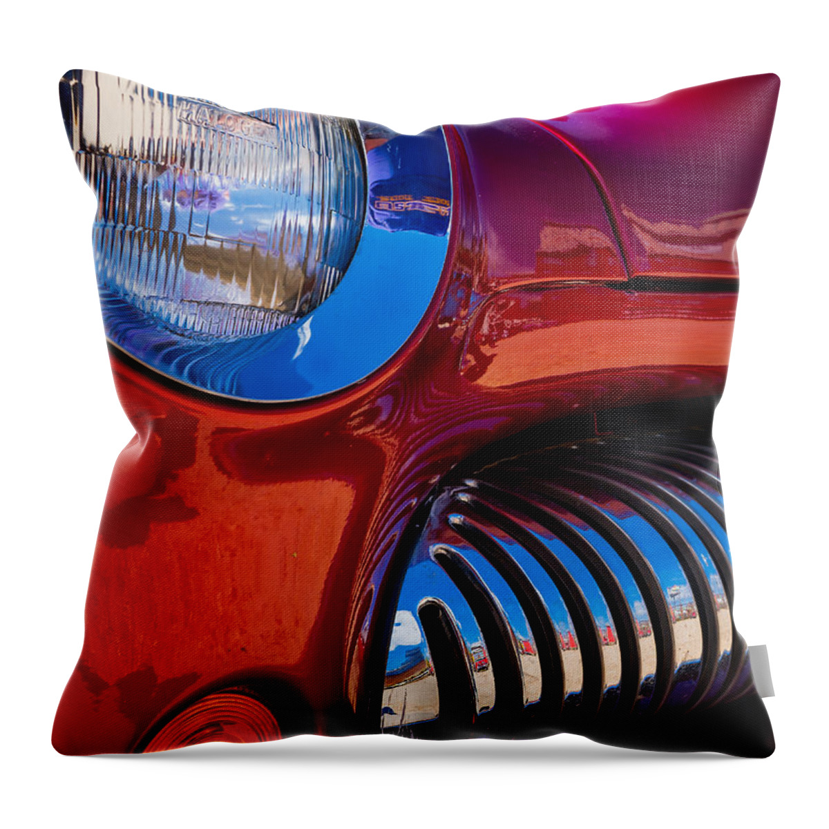 Red Throw Pillow featuring the photograph Red Car Chrome Grill by Tom Gresham