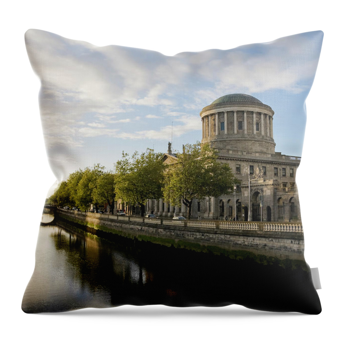 Dublin Throw Pillow featuring the photograph River Liffey And The Four Courts In by Lleerogers