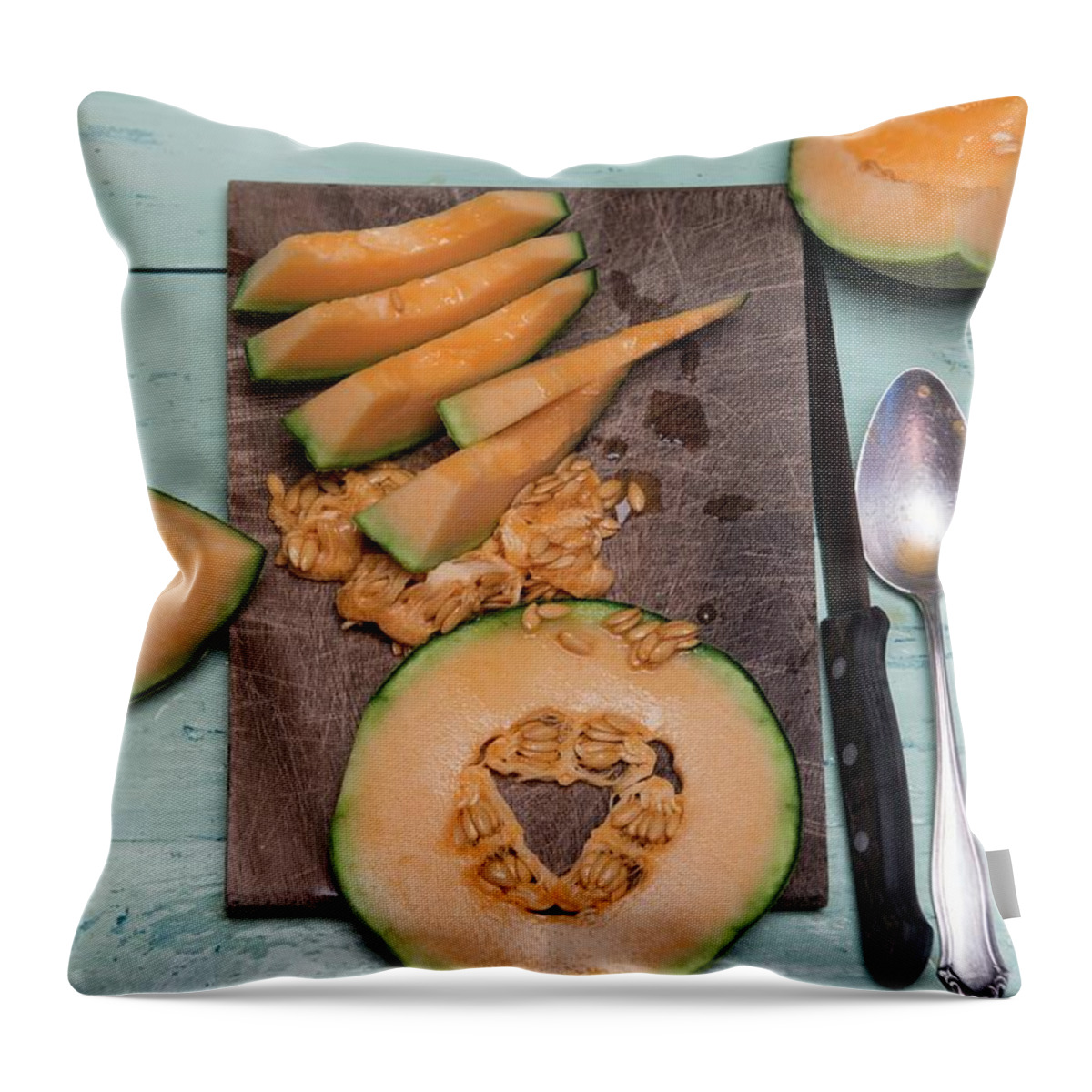 Ip_11434498 Throw Pillow featuring the photograph Slices Of Cantaloupe Melon On A Wooden Board by Angelika Grossmann