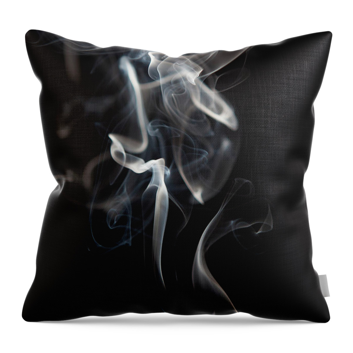 Black Background Throw Pillow featuring the photograph Smoke Trail Against Black Background by Jasper James