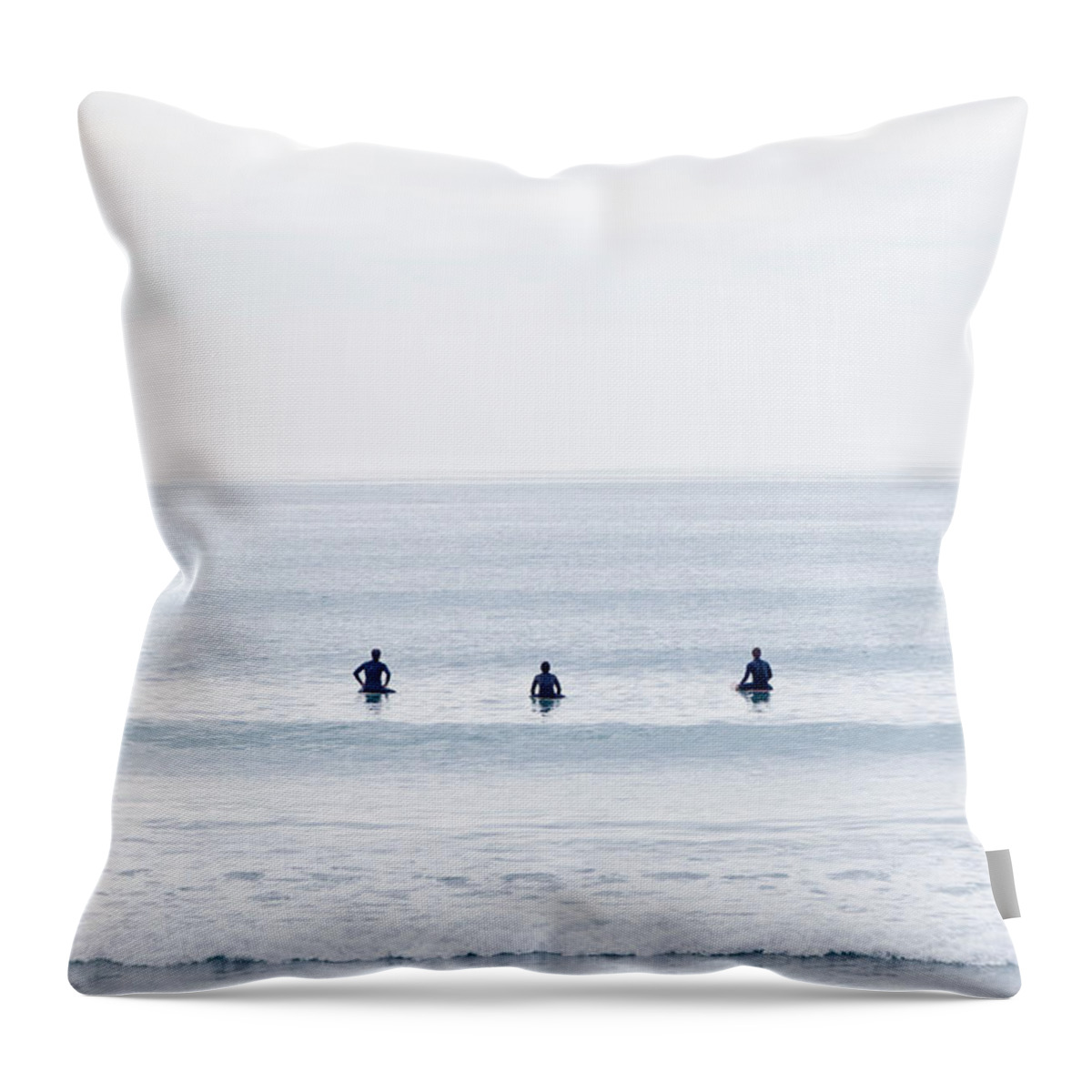 People Throw Pillow featuring the photograph Surfers Astride Boards Waiting For Wave by David Madison