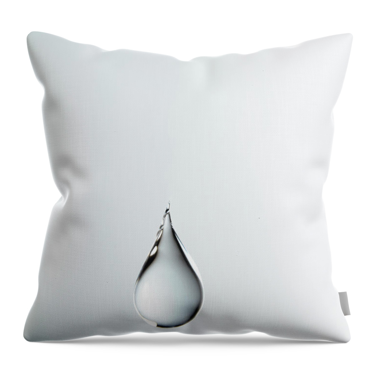 Wind Throw Pillow featuring the photograph Tear Shaped Water Drop Suspended In by Yamada Taro