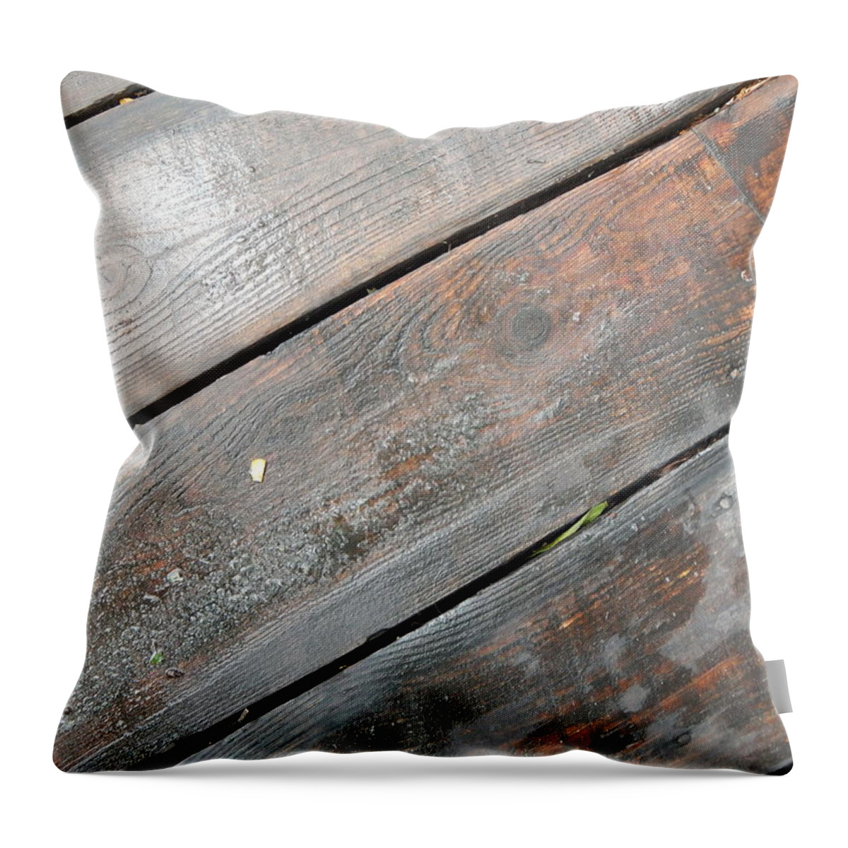 Wood Throw Pillow featuring the photograph Texture of a wooden floor by Oleg Prokopenko