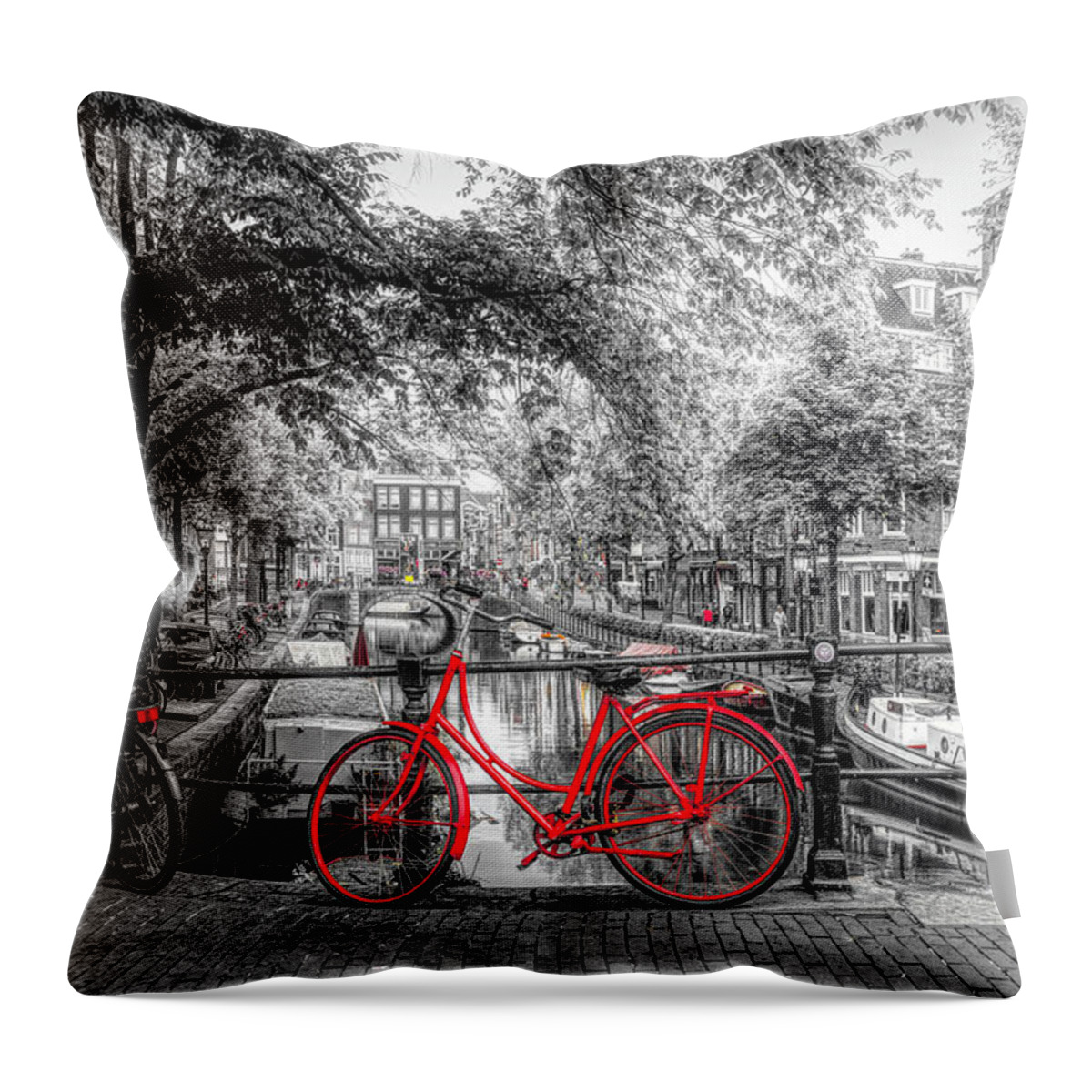 Boats Throw Pillow featuring the photograph The Red Bike in Amsterdam in Color Selected Black and White by Debra and Dave Vanderlaan