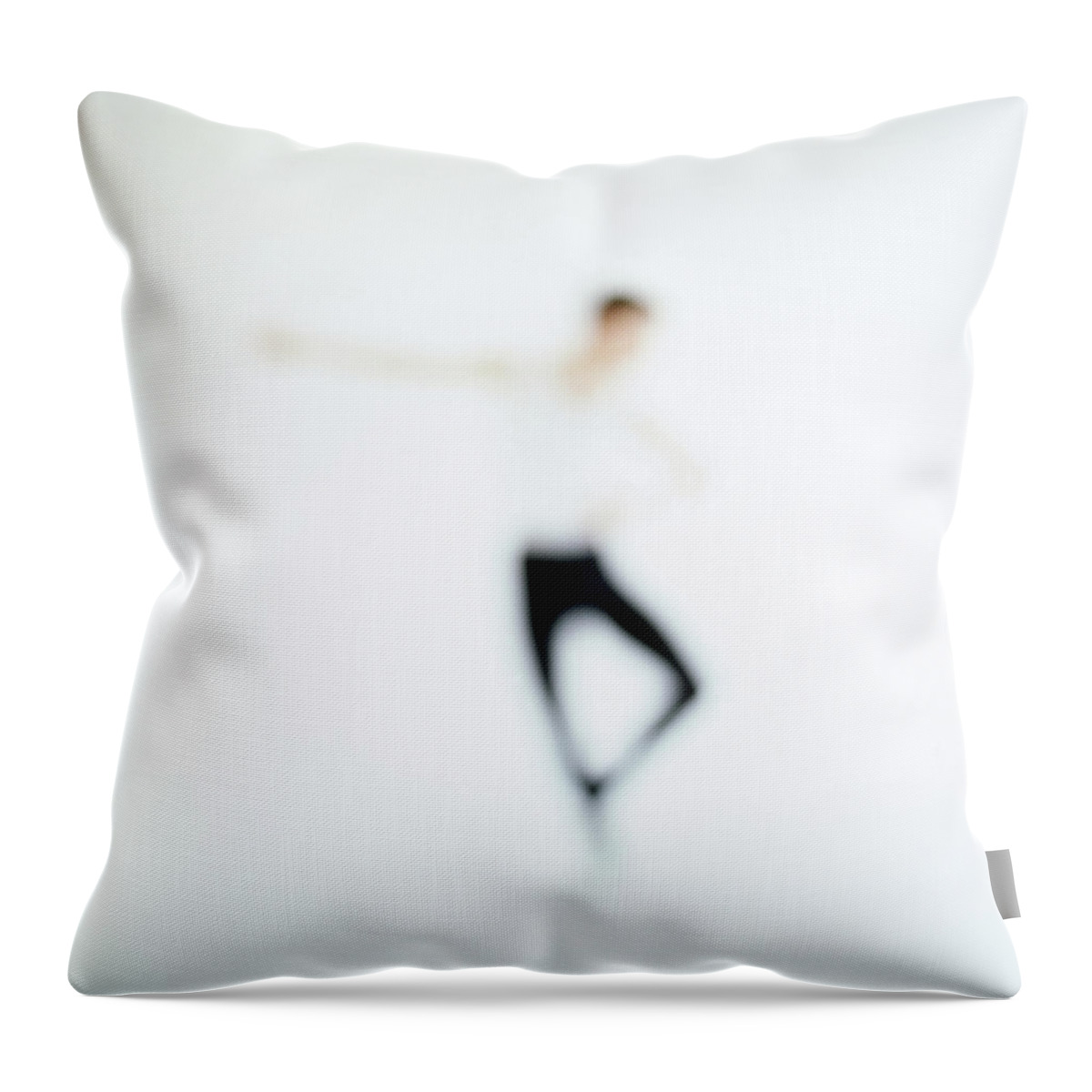 White Background Throw Pillow featuring the photograph Toned View Of A Person Performing Ballet by George Doyle