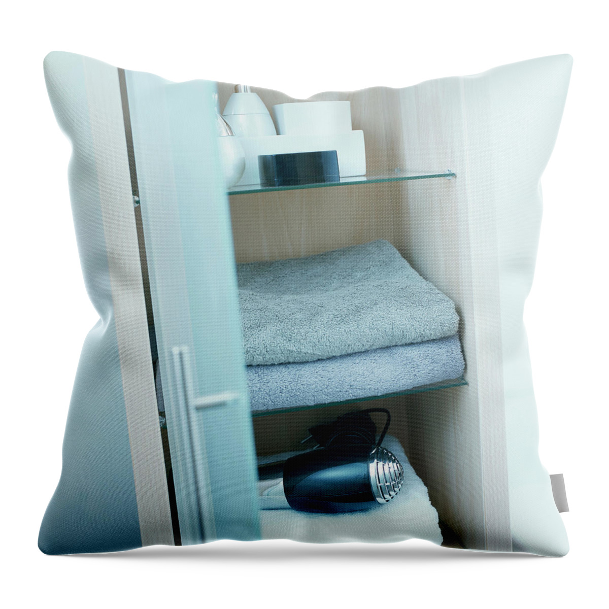 Ip_00340356 Throw Pillow featuring the photograph Towels And Hair Drier On Shelves In A Cupboard by Luc Wauman