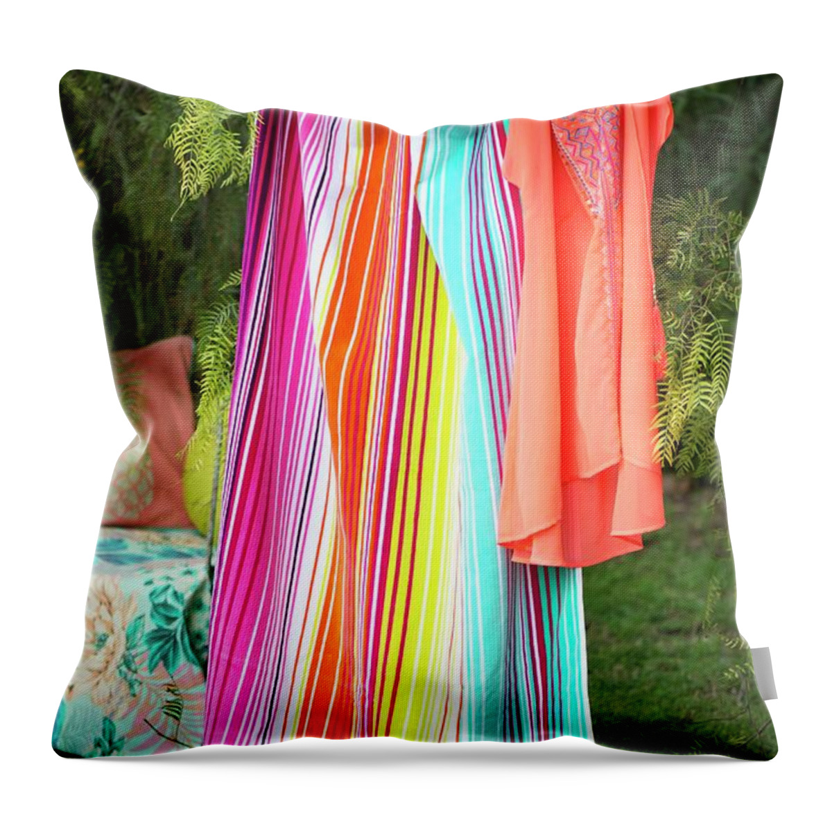 Ip_11507743 Throw Pillow featuring the photograph Tunic And Striped Towel Hung From Washing Line In Garden by Winfried Heinze