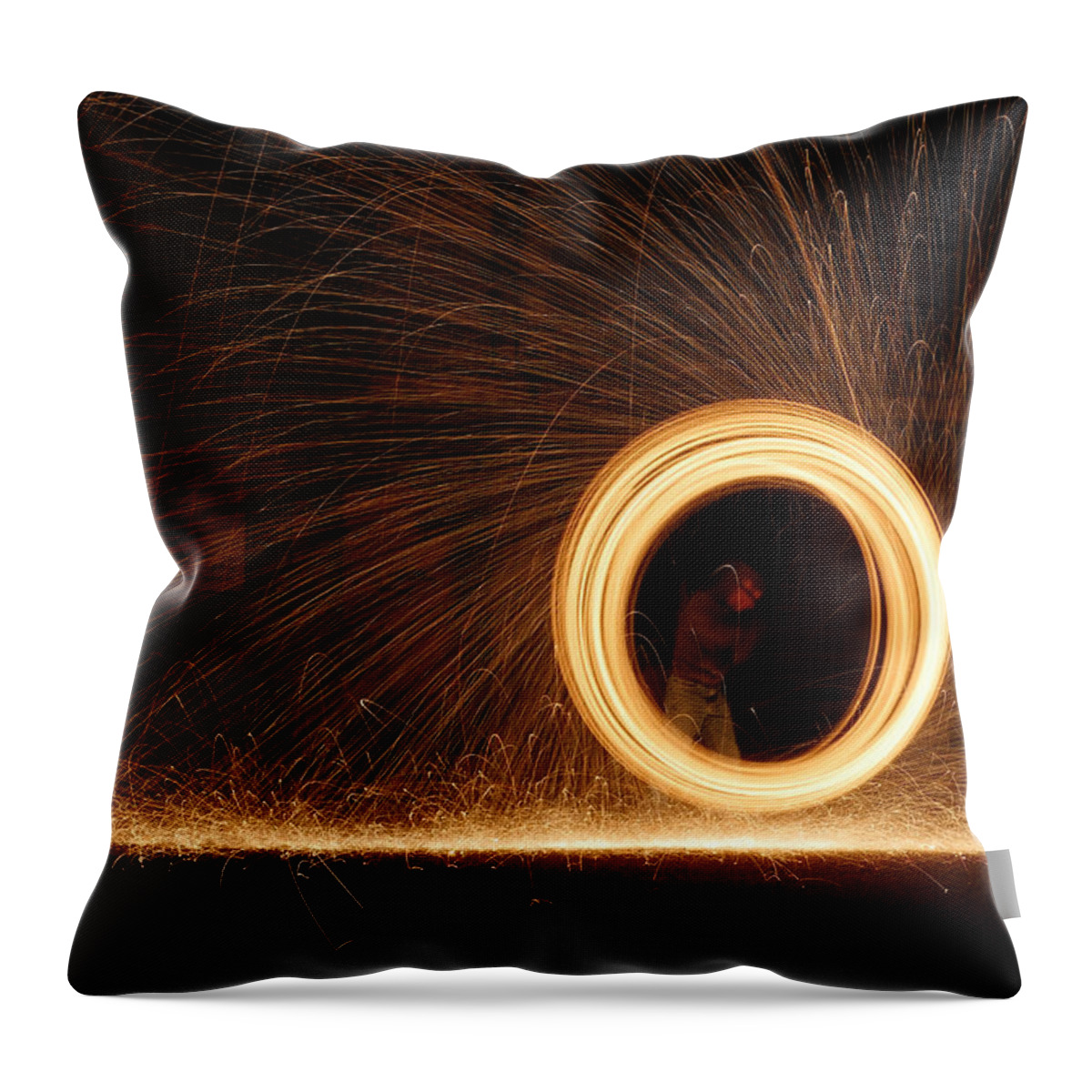 Richard Reeve Throw Pillow featuring the photograph Wheel of Fire by Richard Reeve
