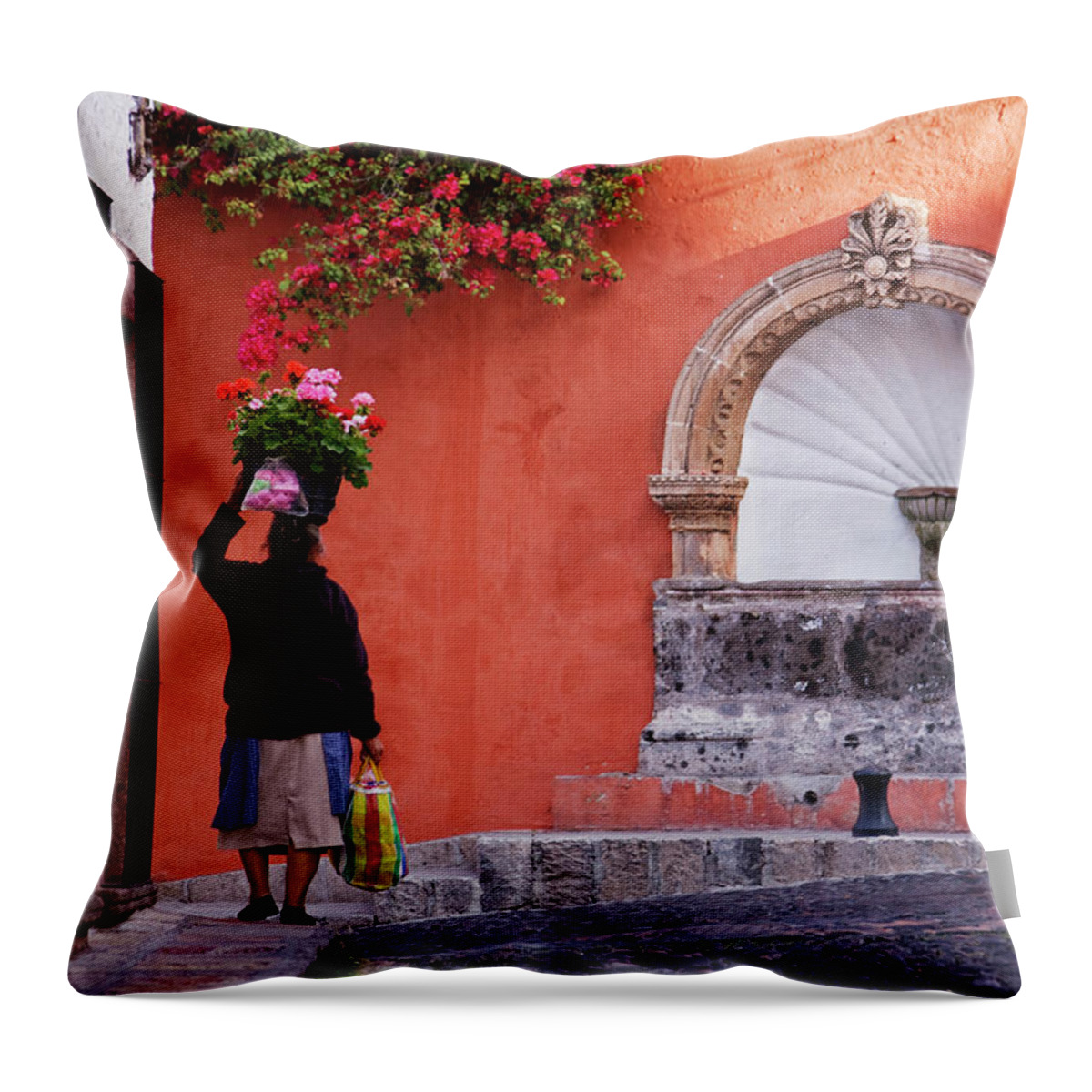Arch Throw Pillow featuring the photograph Woman Carrying Flowers On Her Head On by Pixelchrome Inc