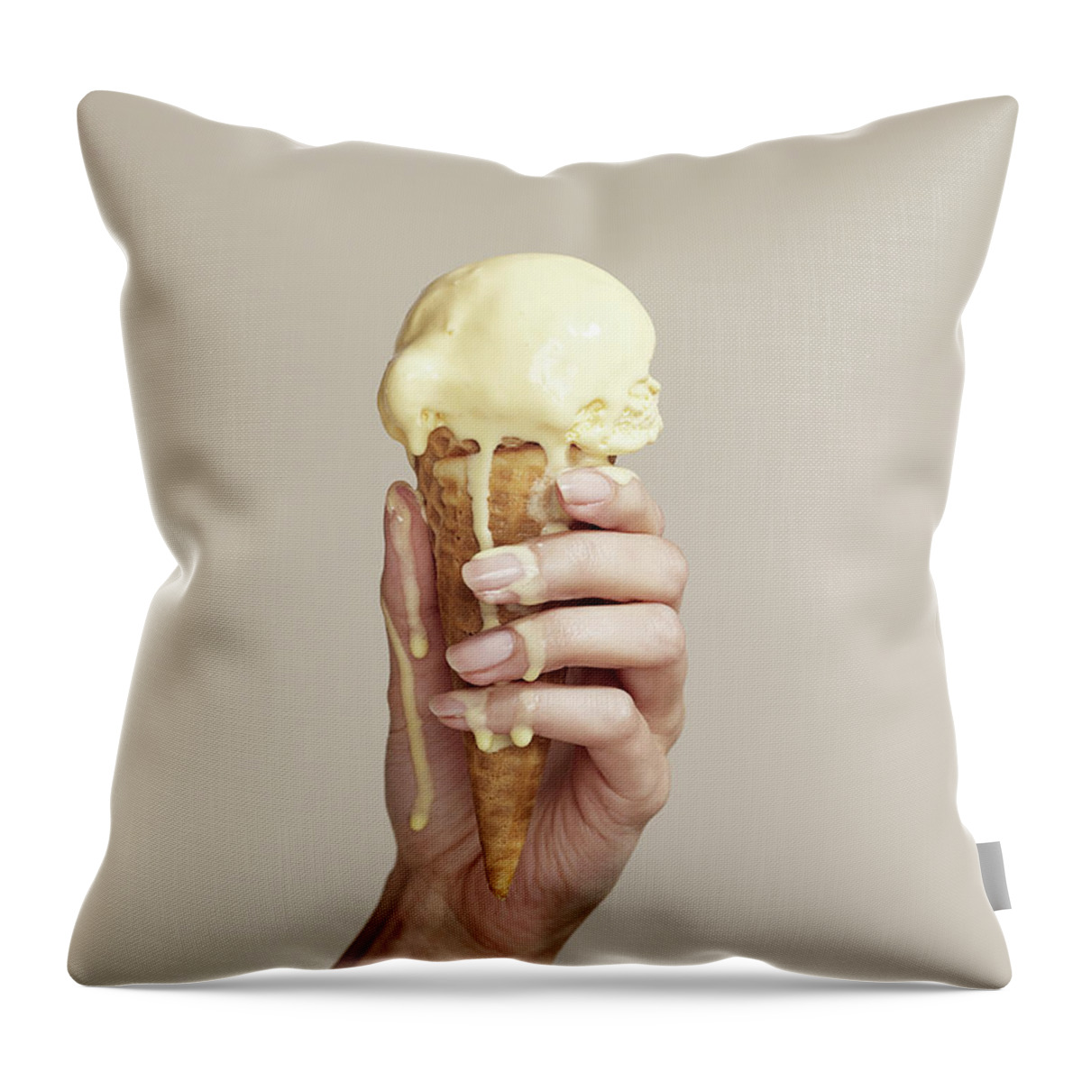 Melting Throw Pillow featuring the photograph Woman Holding Melting Ice Cream Cone by Walker And Walker