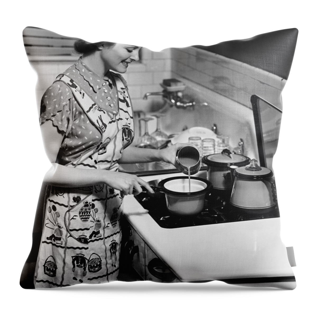 Working Throw Pillow featuring the photograph Woman Preparing Food On Stove by George Marks