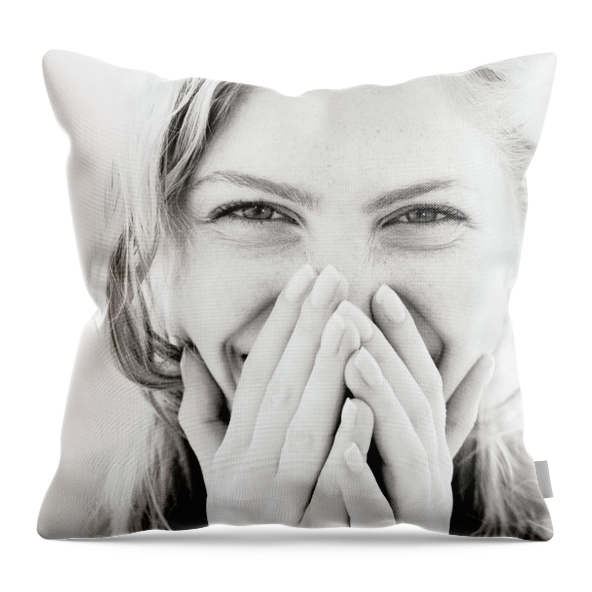 White Background Throw Pillow featuring the photograph Young Woman Laughing, Hands Over Mouth by Pando Hall