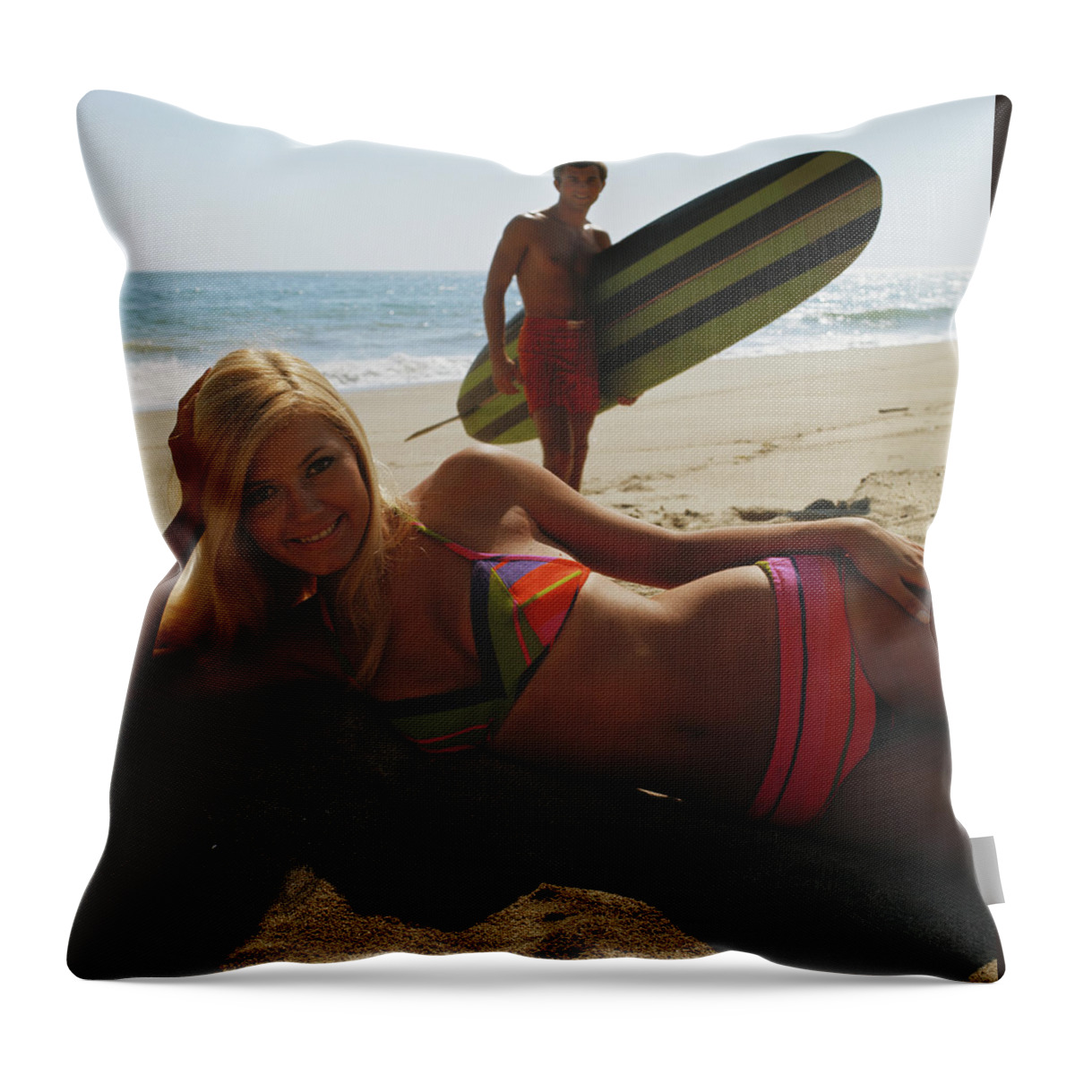 Young Men Throw Pillow featuring the photograph Young Woman Lying On Beach With Man by Tom Kelley Archive
