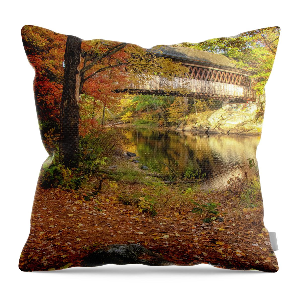 The Gorgeous Henniker Covered Bridge On A Beautiful Fall Day In October Seen Throuh The Woods. Henniker Throw Pillow featuring the photograph Covered Bridge in Autumn #1 by Donna Doherty