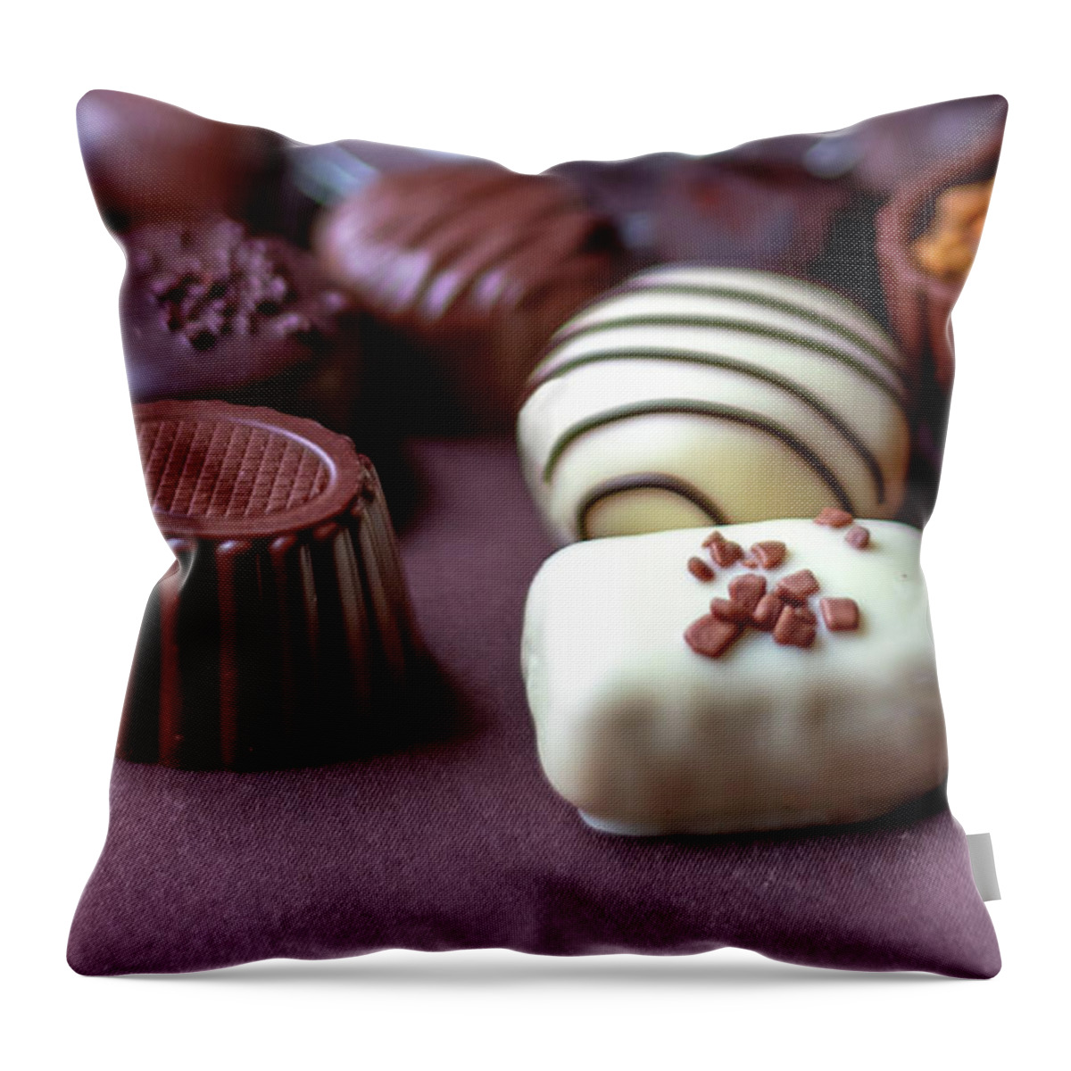 Food Throw Pillow featuring the photograph Fancy chocolates #1 by Susan Sheldon