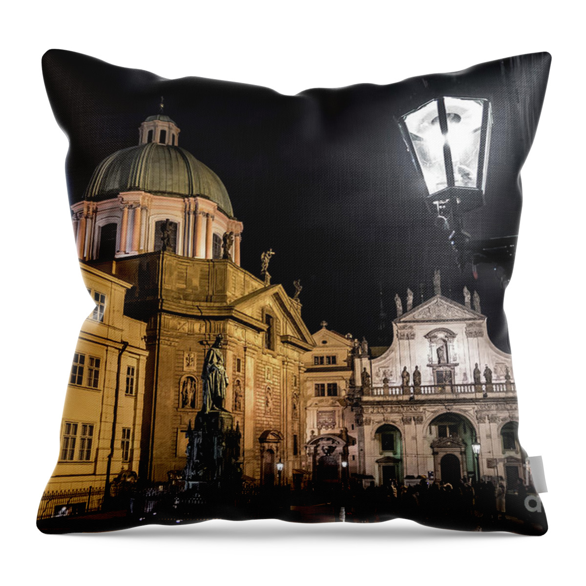 Prague Throw Pillow featuring the photograph Historic Buildings Beneath The Tower Of Charles Bridge In The Night In Prague In The Czech Republic #1 by Andreas Berthold