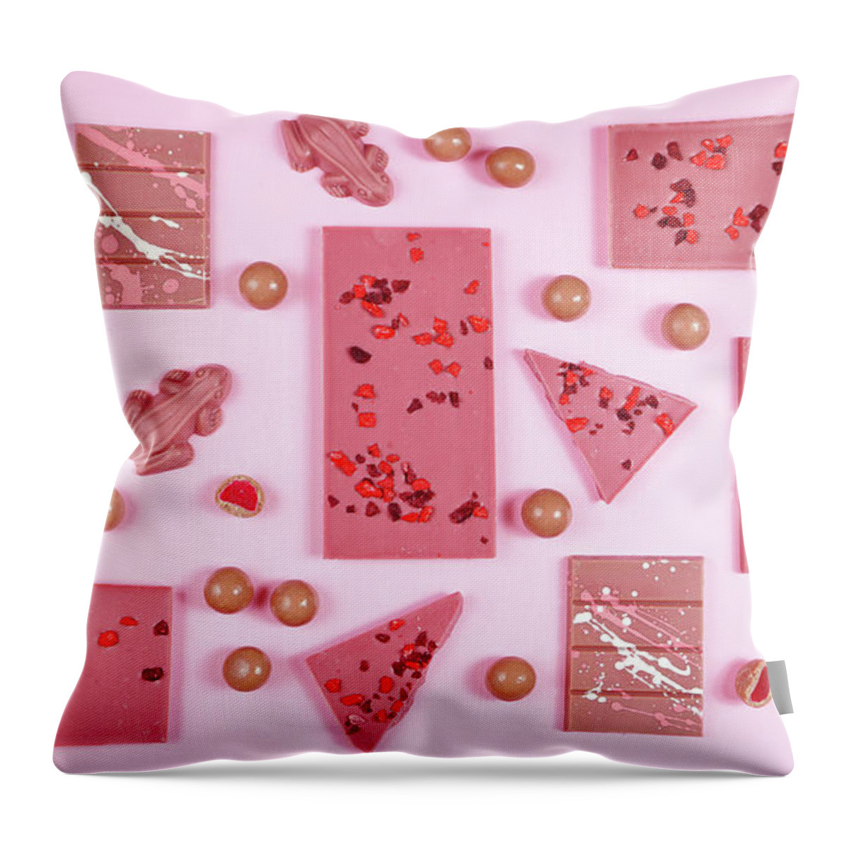 Ruby Throw Pillow featuring the photograph Ruby chocolate selection flat lay overhead on pink background. #1 by Milleflore Images