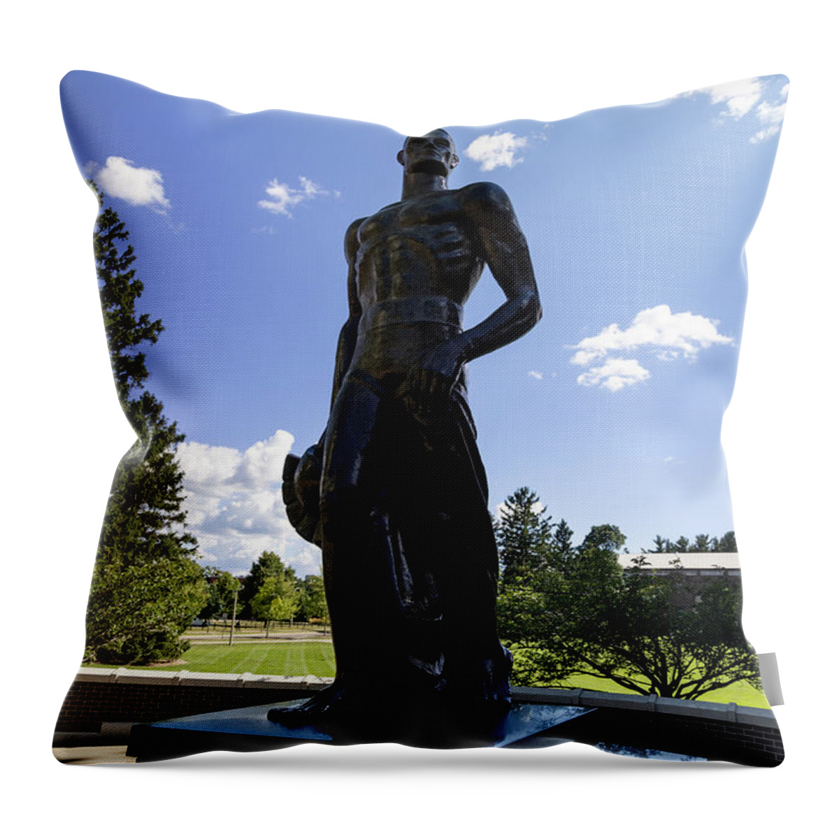 University Tour Throw Pillow featuring the photograph Spartan statue on the campus of Michigan State University in East Lansing Michigan #1 by Eldon McGraw