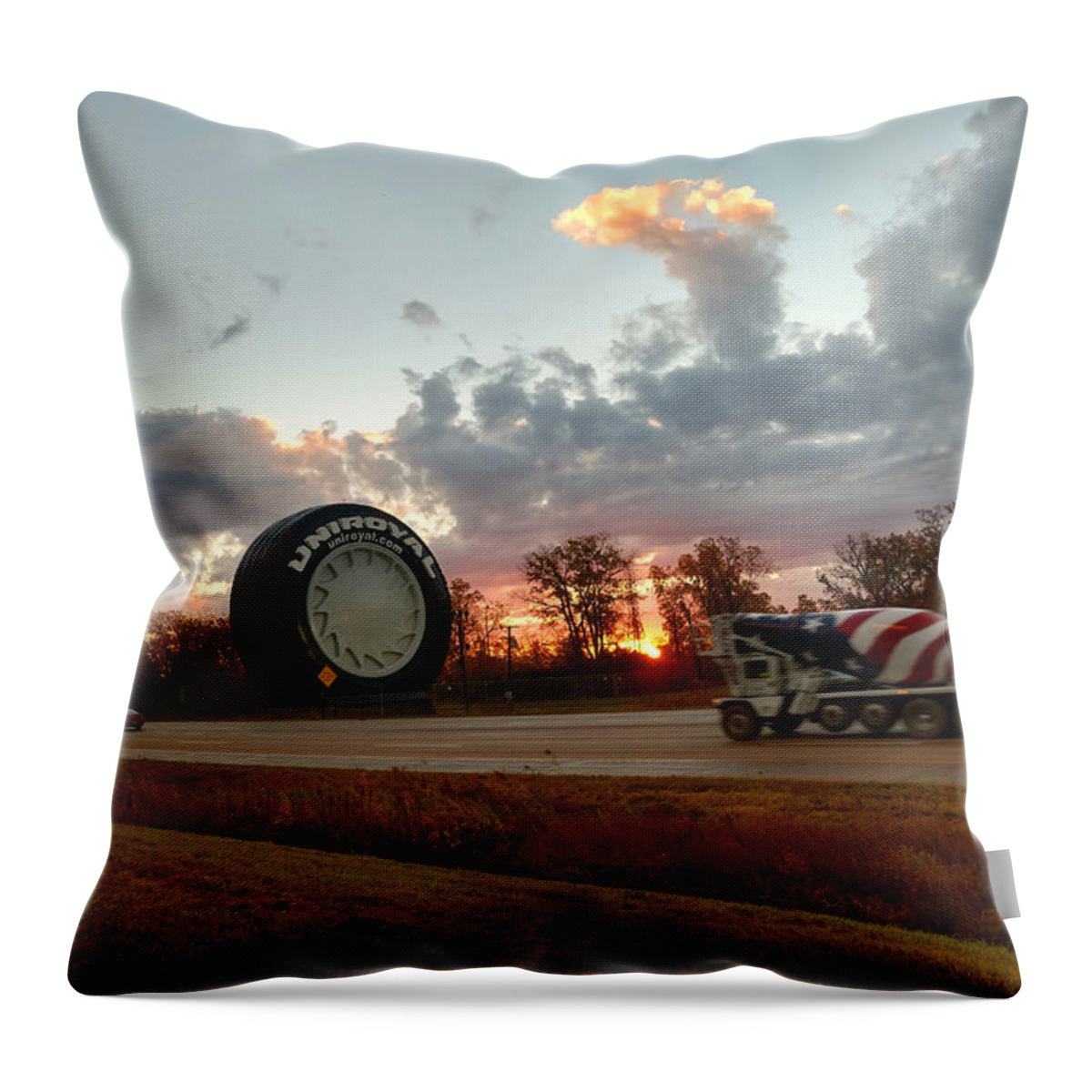 The Uniroyal Tire Throw Pillow featuring the photograph The Uniroyal Tire #1 by Michael Rucker