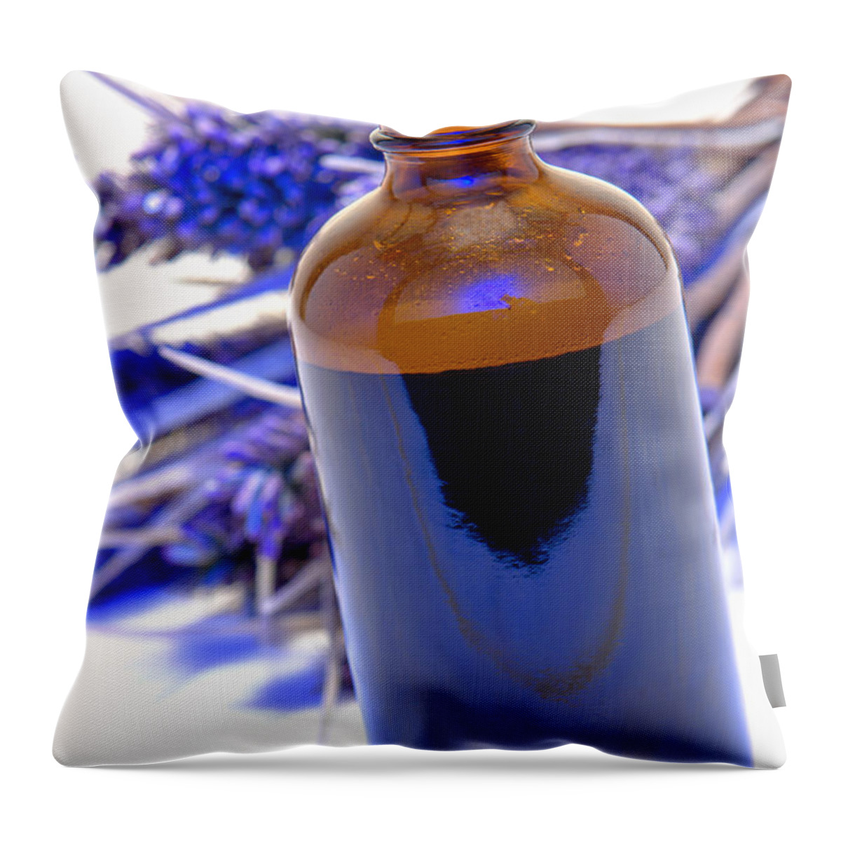 Aromatherapy Throw Pillow featuring the photograph Aromatherapy Bottle with Blue Flower Background by Olivier Le Queinec
