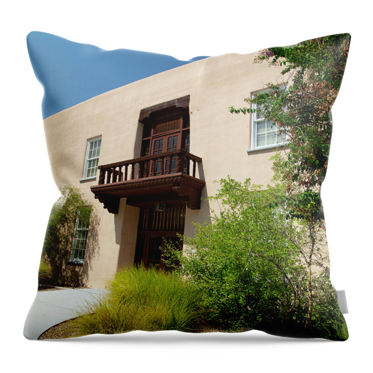 University Of New Mexico Lobos Throw Pillow featuring the photograph Alumni chapel on the campus of the University of New Mexico by Eldon McGraw