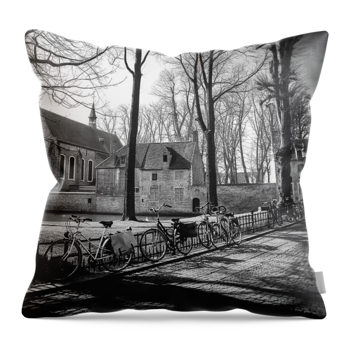 Bruges Throw Pillow featuring the photograph Bicycles of Bruges Belgium Black and White by Carol Japp