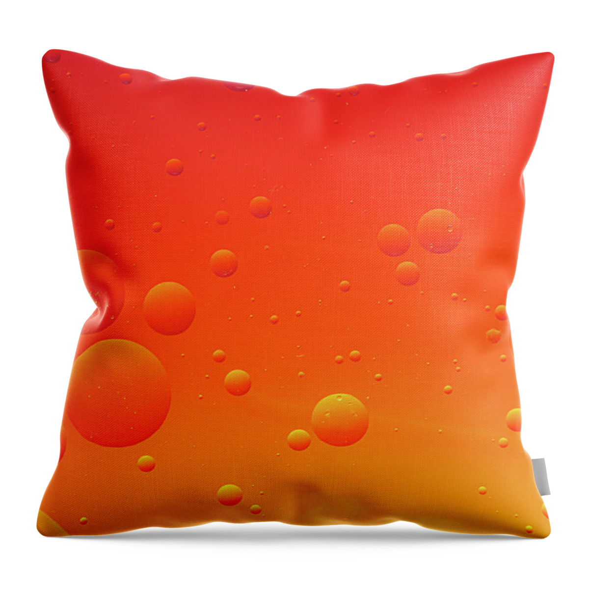 Abstract Throw Pillow featuring the photograph Bright abstract, red background with flying bubbles by Michalakis Ppalis