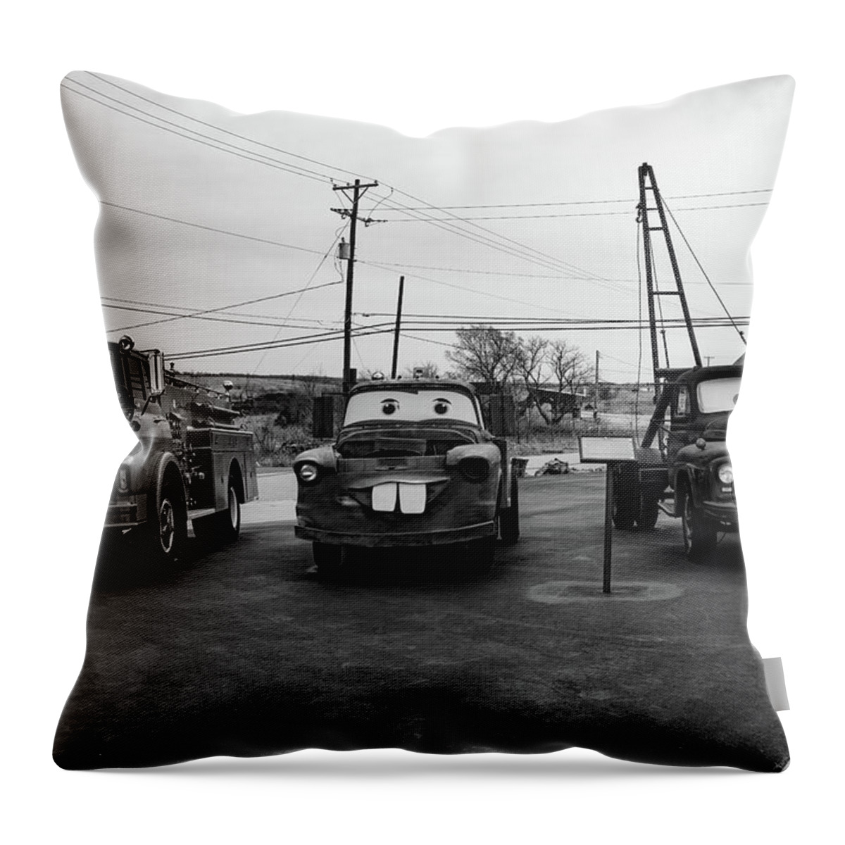 Cars On Route 66 Throw Pillow featuring the photograph Cars on Route 66 in Galena Kansas in black and white by Eldon McGraw