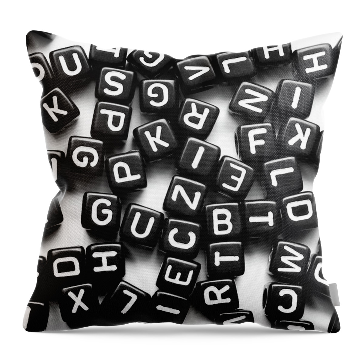 Find Throw Pillow featuring the photograph Close Up Of The Black Letters Background by Severija Kirilovaite