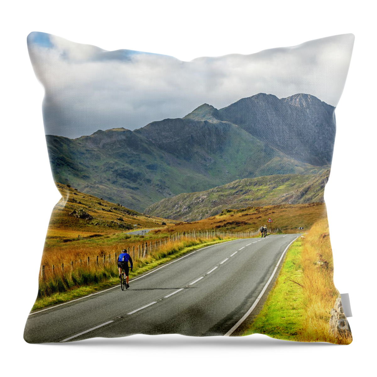 Snowdon Throw Pillow featuring the photograph Cyclist Snowdonia Wales by Adrian Evans