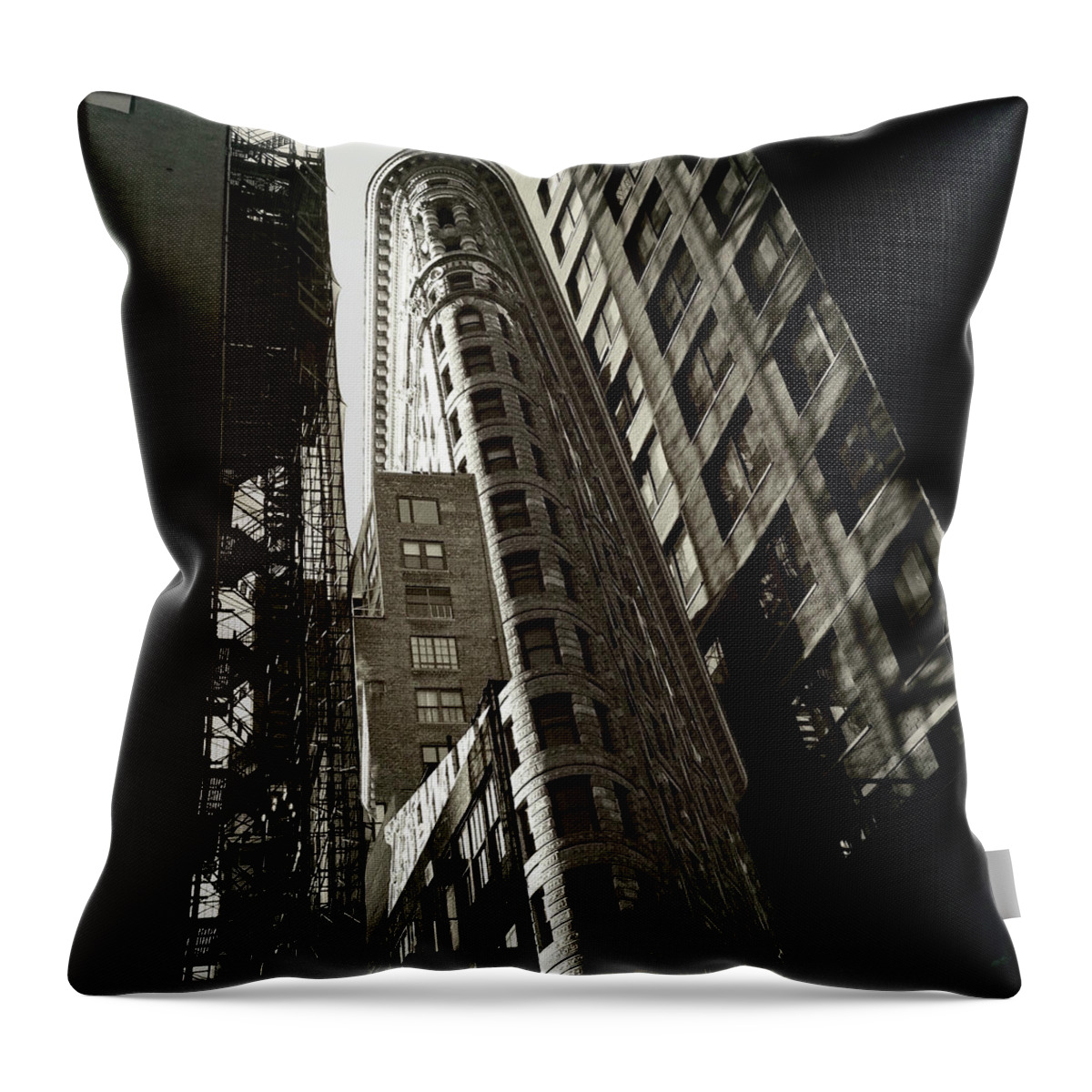 ‘flatiron Building’ Throw Pillow featuring the photograph Flatiron Building With A Twist by Carol Whaley Addassi