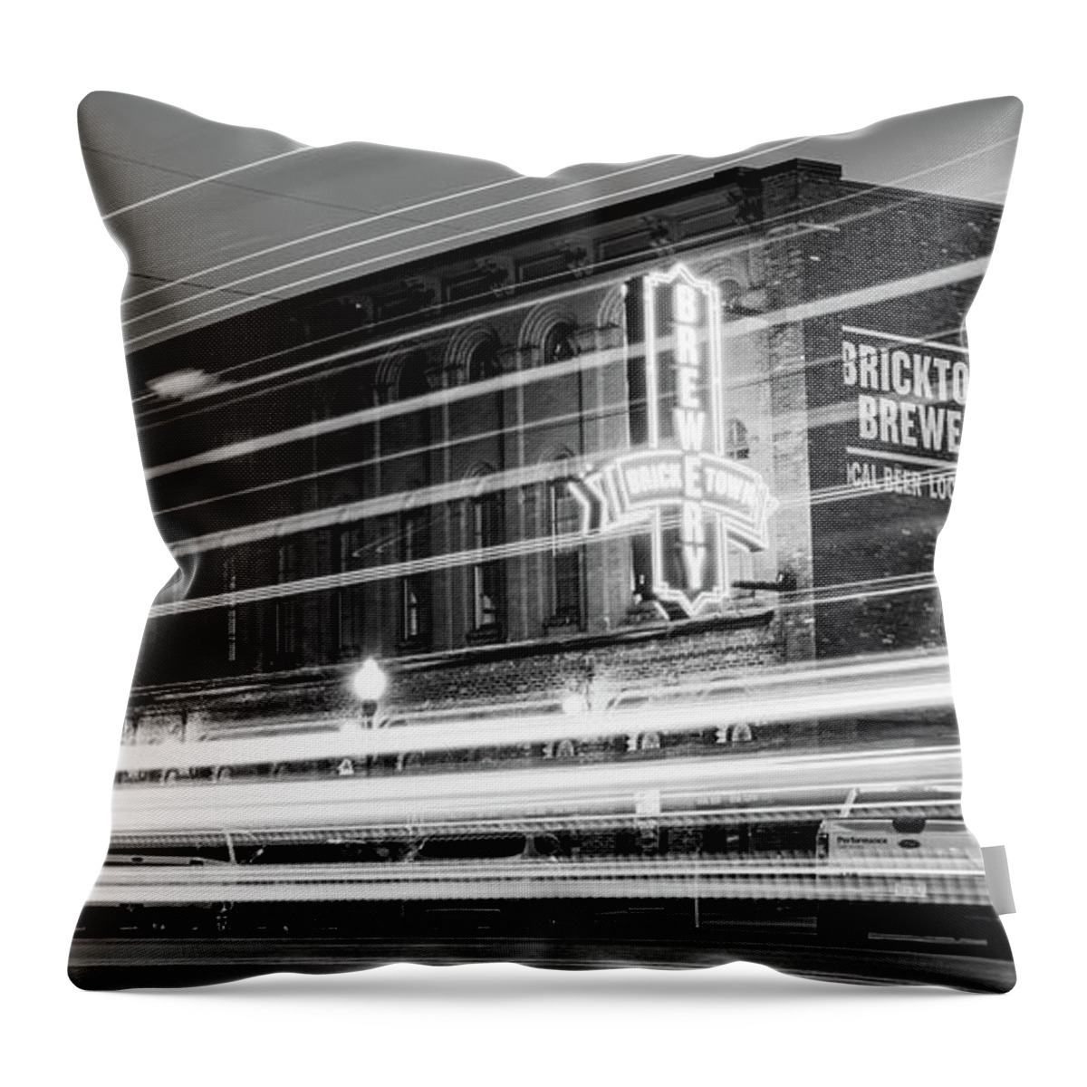Fort Smith Throw Pillow featuring the photograph Fort Smith Light Trails And Brewery Neon - Monochrome Panorama by Gregory Ballos