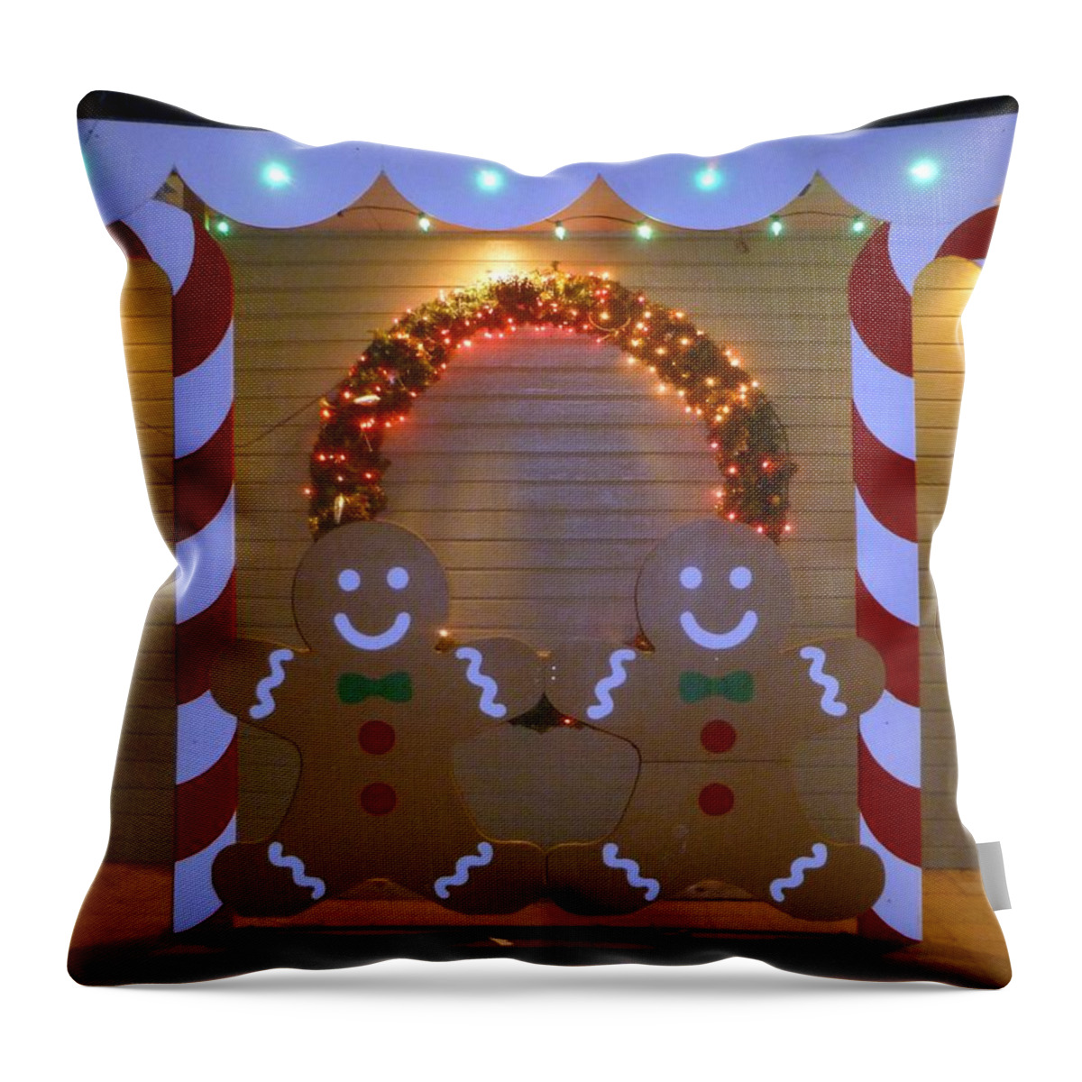 Trees Throw Pillow featuring the photograph Gingerbread men by Jean Evans