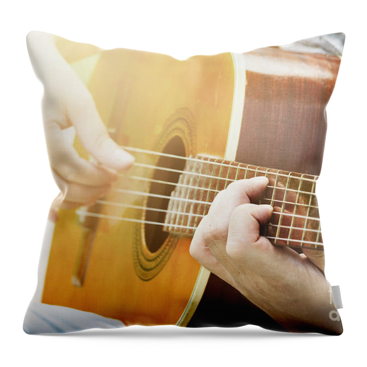 Guitar Throw Pillow featuring the photograph Guitar. Man plays the guitar closeup by Jelena Jovanovic