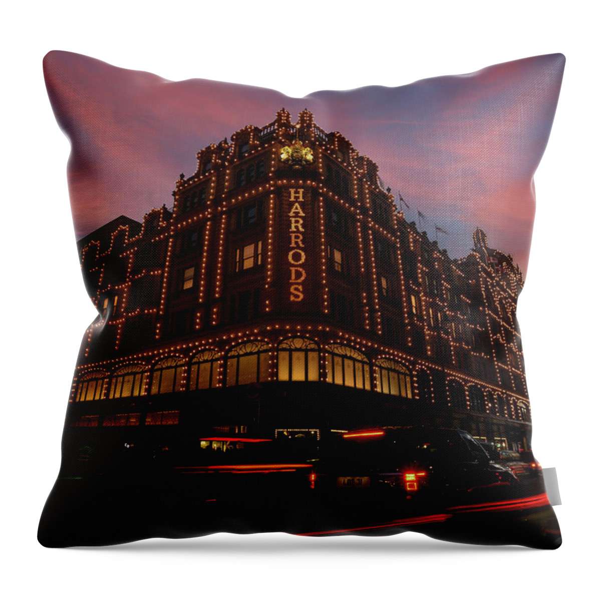 Christmas Throw Pillow featuring the photograph Harrods at sunset by Andrew Lalchan