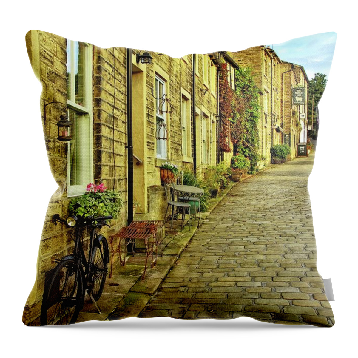 Howarth Throw Pillow featuring the photograph Howarth, West Yorkshire. by David Birchall
