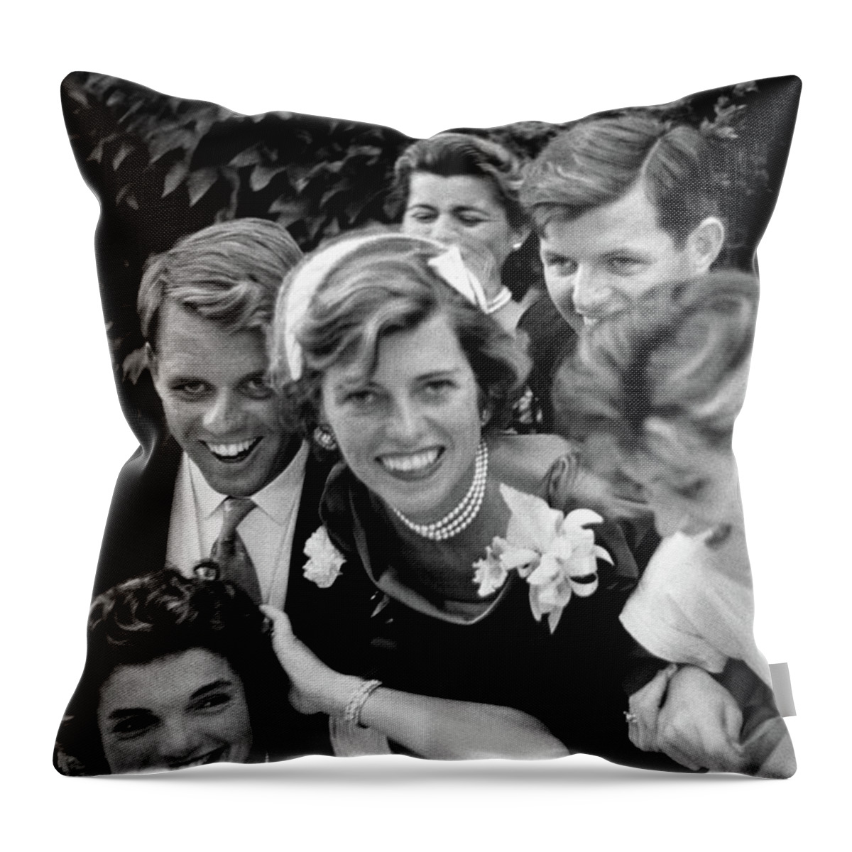 President Kennedy Throw Pillow featuring the photograph Kennedy Family Embracing John and Jackie At Wedding - 1953 by War Is Hell Store