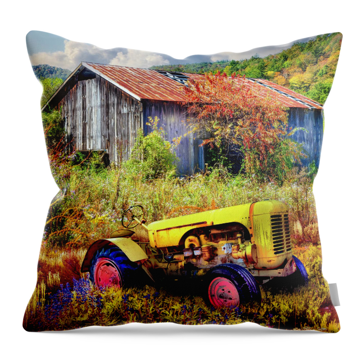 Barns Throw Pillow featuring the photograph Little Yellow Tractor in Wildflowers by Debra and Dave Vanderlaan