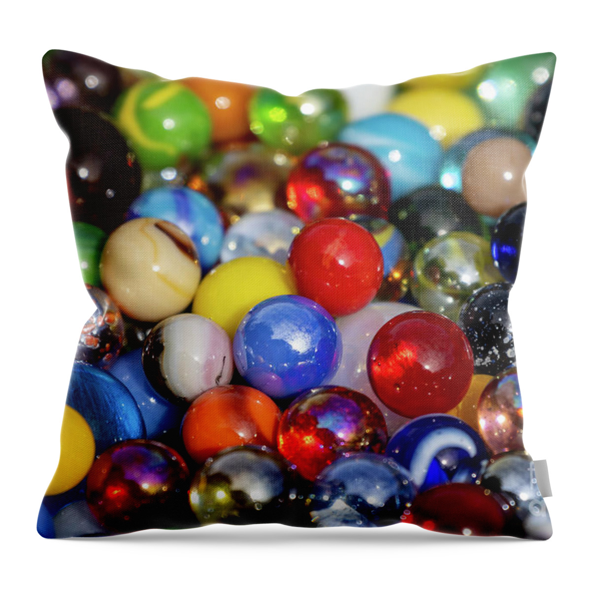 Marble Throw Pillow featuring the photograph Marbles by Vivian Krug Cotton