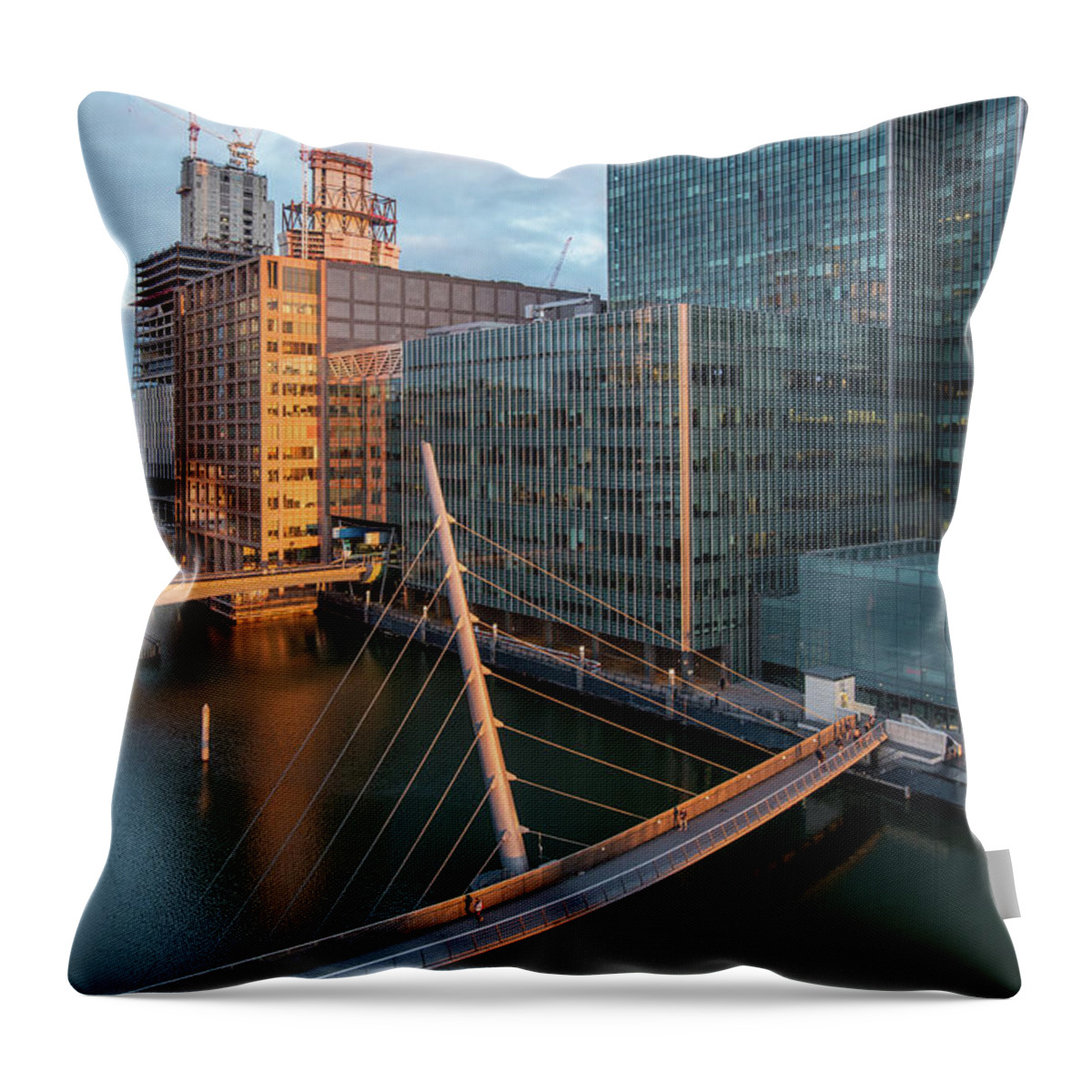 Canary Wharf Throw Pillow featuring the photograph Modern office building in the Canary Wharf financial centre in the evening. London united kingdom by Michalakis Ppalis